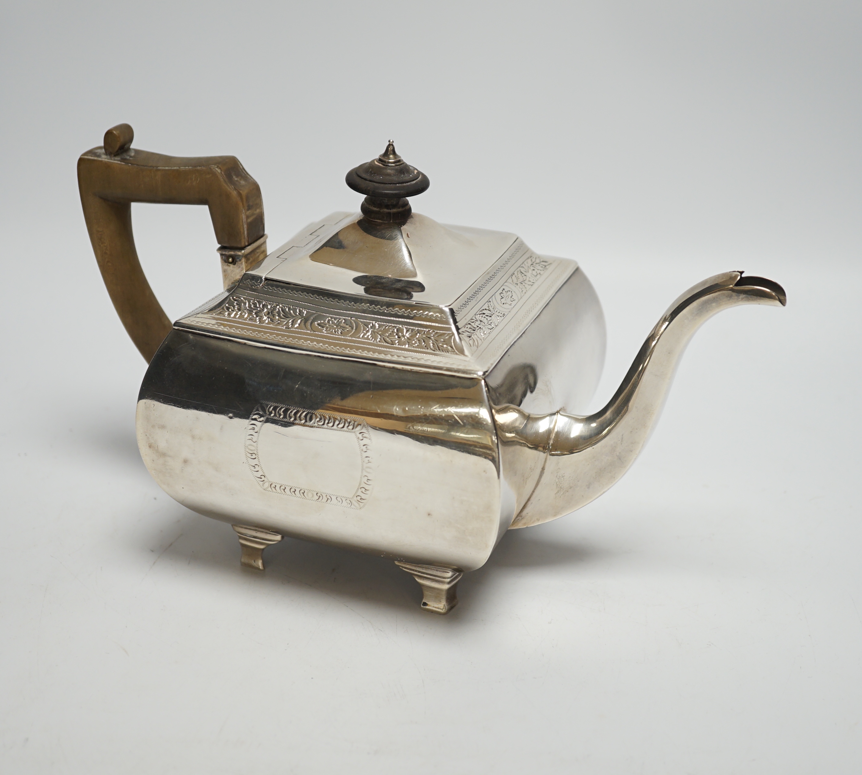 A George III silver shaped square teapot, by Urquhart & Hart, London, 1805, on bracket feet, gross weight 19.4oz.